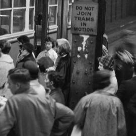 Fascia Image - Boarding the tram, Wynyard underground station, 1958