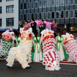 Dignitaries surrounded by dragons, Chinese New Year Parade, Sydney, 2009