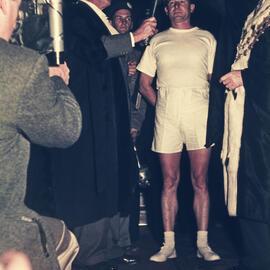 Lord Mayor Pat Hills with the torch for the 1956 Melbourne Olympic Games, Sydney Town Hall, 1956