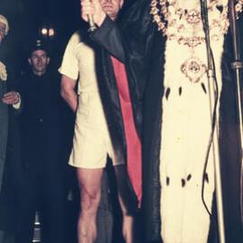 Lord Mayor Pat Hills with the torch for the 1956 Melbourne Olympic Games, Sydney Town Hall, 1956