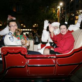 Lord Mayor Clover Moore in coach with Santa Claus, Martin Place 2008