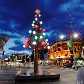 A 'Christmas tree' and Christmas banners at Taylor Square, Christmas 2010