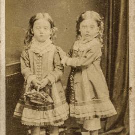 Studio portrait of two daughters of Mayor John Harris, Bathurst Street Sydney, circa 1880
