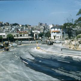Workers sweeping Cahill Expressway, Sydney, 1958-1962