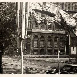 Sun arch decoration for royal visit of Queen Elizabeth II, Bridge Street Sydney, 1954