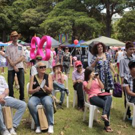 Crowd in front of the pink Mardi Gras logo, Victoria Park, Mardi Gras Fair Day, 2011