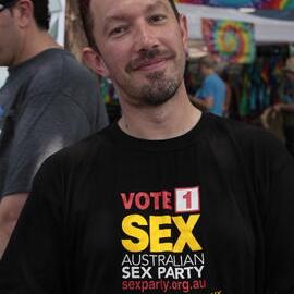 Big smile and Australian Sex Party t-shirt, Victoria Park, Mardi Gras Fair Day, 2012