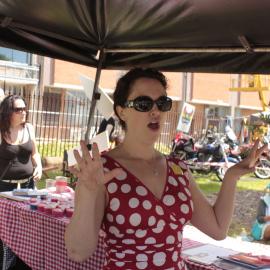 Femme Guild, spruiking at their stall, Victoria Park, Mardi Gras Fair Day, 2012