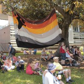 Large BEAR flag flying from a tree in Victoria Park, Mardi Gras Fair Day, 2012