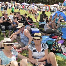 Family and friends gathered under the shade of trees in Victoria Park, Mardi Gras Fair Day, 2012