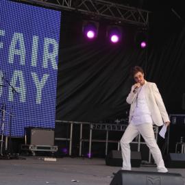Drag King Rocco L'Amore on main stage, Victoria Park, Mardi Gras Fair Day, 2012