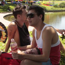 Three young men poolside, Victoria Park, Mardi Gras Fair Day, 2012