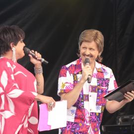Bob Downe and compere on stage, Mardi Gras Fair Day, 2012