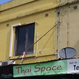 Shop signs on front of buildings, Glebe Point Road, Glebe, 2012