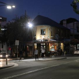 Street lights are on in Glebe Point Road, Glebe, 2021