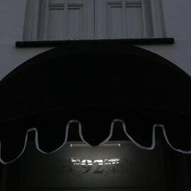 Doorway of No 92 lit up, Glebe Point Road, Glebe, 2021
