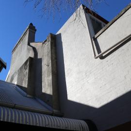 Stark walls and verandah awning against blue skies, Glebe, 2018