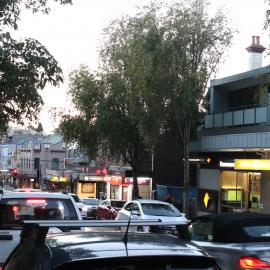 Traffic at dusk, a busy time in Glebe Point Road, Glebe, 2021