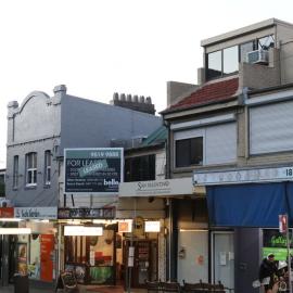 Shops and businesses at dusk, Glebe Point Road, Glebe, 2021