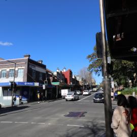 Pedestrians at traffic lights Glebe Point and Bridge Roads, Glebe, 2022