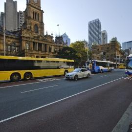 Enormous yellow bus outside Sydney Town Hall, George Street, Sydney, 2008