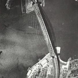 Aerial view of Sydney Harbour Bridge, showing Walsh Bay and Luna Park