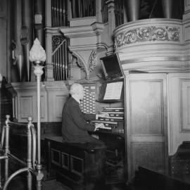 City Organist, Mr E. Truman, at the Console of the Town Hall organ 1936