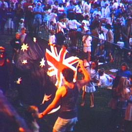 People holding the Australian flag, Australia Day Family Concert, 1985