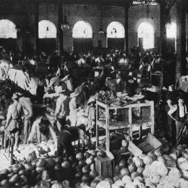 Fruit and vegetable stallholders inside Belmore Market, Campbell Street Haymarket, 1913