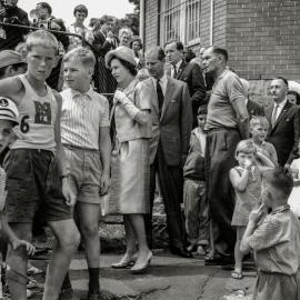 HM Queen Elizabeth II visits a children's playground