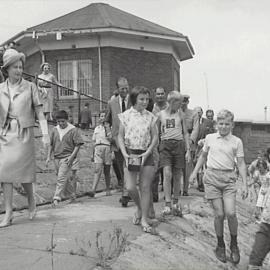 HM Queen Elizabeth II visits a children's playground