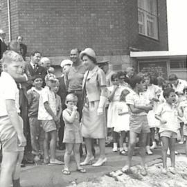 HM Queen Elizabeth II visits a children's playground