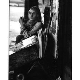 Boy selling newspapers, Glebe, 1973
