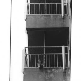 Child on balcony at Johanna O'Dea Court, Pyrmont Bridge Road Camperdown, 1973