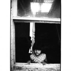 Young girl at window, Glebe, 1973