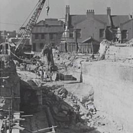 Excavation for elevated expressway.