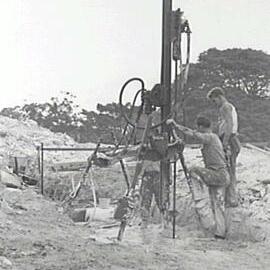 Workers with broaching machine