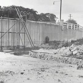 Preliminary site work, pedestrian bridge