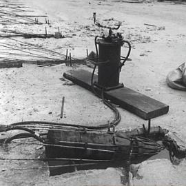 Detail of concrete, wires and pieces of machinery