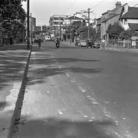 Looking east along Cleveland Street towards the corner of Chalmers Street Surry Hills, 1930s.