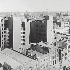 Macdonnell House and city buildings from corner of George and Park Streets Sydney, 1930