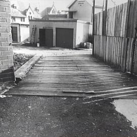 Timber bridge & fence near Chevron Hotel excavation