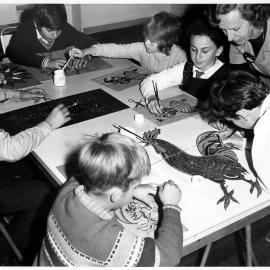 'Children of all ethnic backgrounds learn to make mosaic pictures'