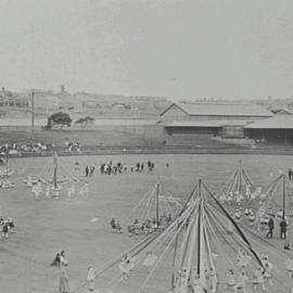Children dancing around May Poles, Agricultural Society Showground, Moore Park, 1900