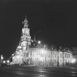 Sydney Town Hall illuminated at night for coronation of King George V, 1937
