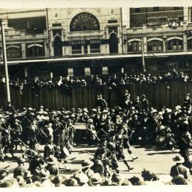 Pipe band and parade celebrating end of World War I, Castlereagh Street Sydney, 1918