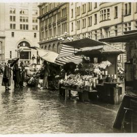 Flower and newspaper stands and sellers, Martin Place Sydney, 1933