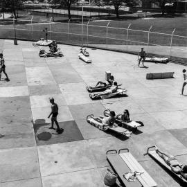 Relaxing at Victoria Park Swimming Pool Camperdown, 1960s