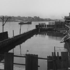 Dilapidated building, fence and pool at Pyrmont Baths, 1929