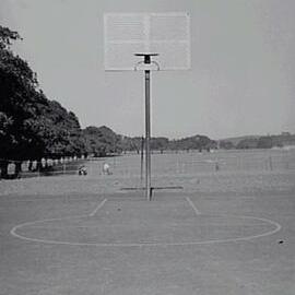 Basketball hoop and court at Moore Park Playground